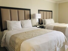 Standard Room with Two Queen Beds | In-room safe, desk, blackout drapes, free cribs/infant beds