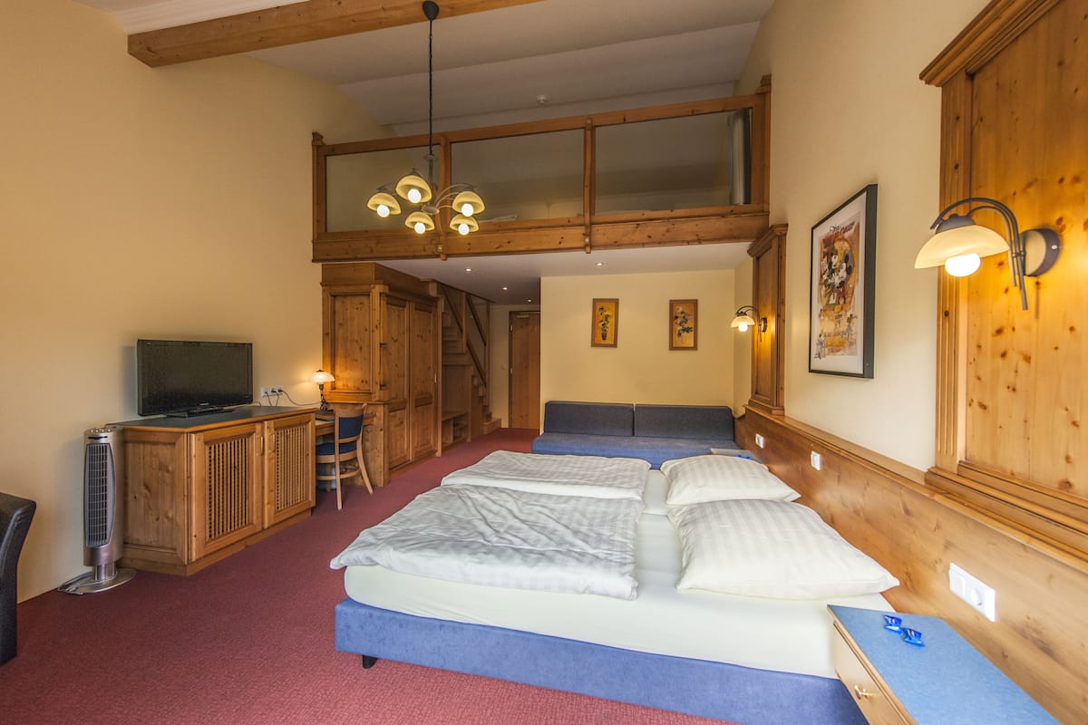 quadruple room, balcony | in-room safe, desk, blackout curtains, soundproofing