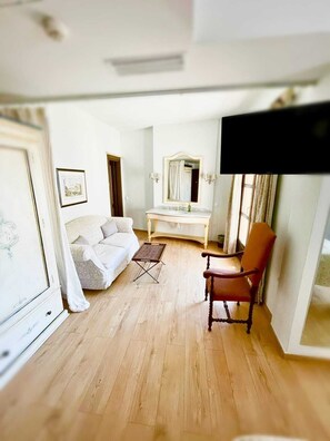 Junior Suite | 1 bedroom, premium bedding, down comforters, minibar
