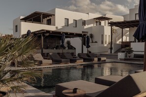 Outdoor pool, open 8:00 AM to 8:00 PM, pool umbrellas, sun loungers