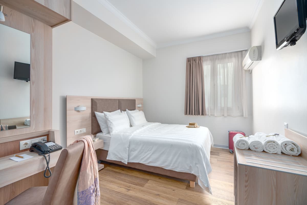 Kamer, 1 twee- of 2 eenpersoonsbedden | Luxe beddengoed, Select Comfort-bedden, een kluis op de kamer