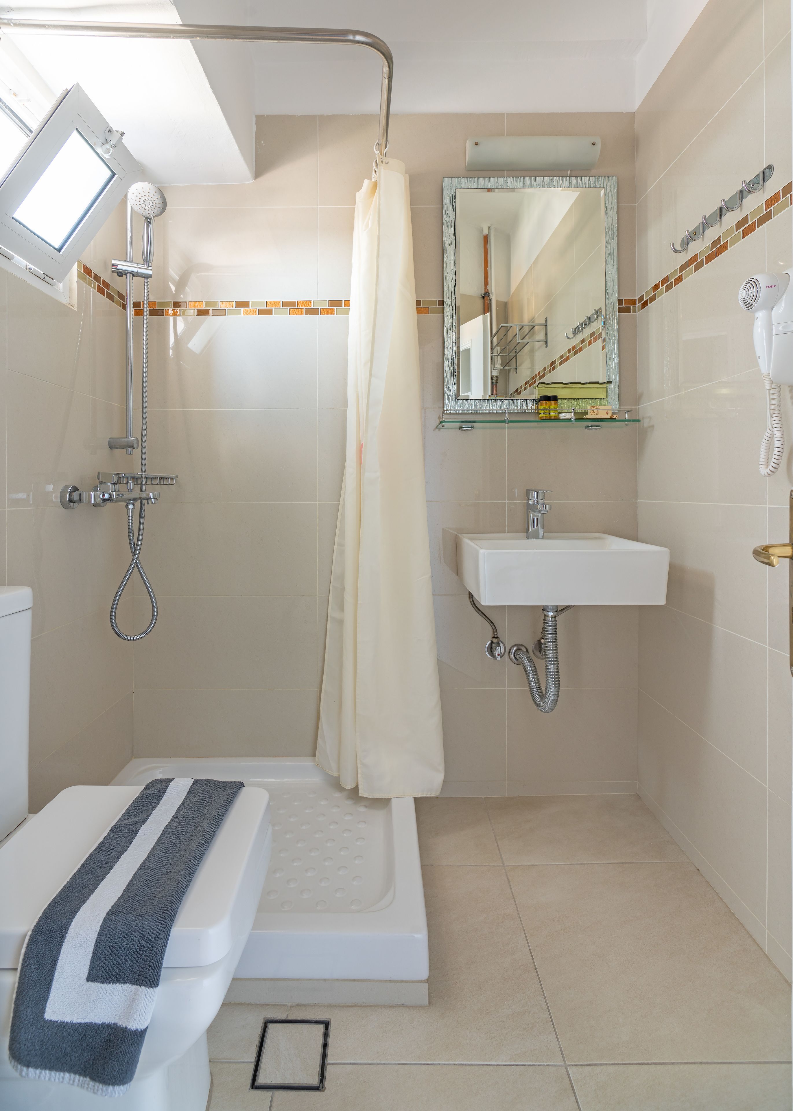 shower, eco-friendly toiletries, hair dryer, slippers