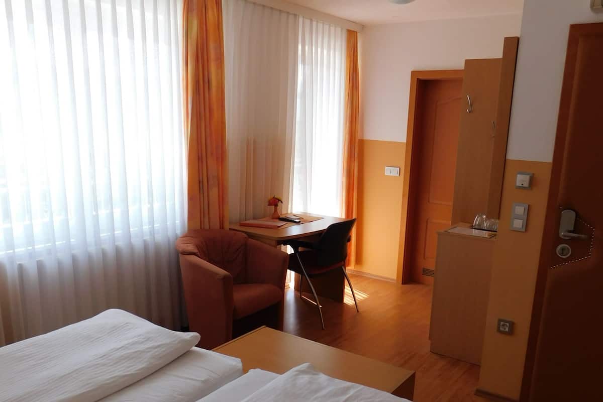 Standard Double Room | Minibar, in-room safe, blackout drapes, soundproofing