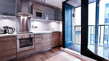 Microwave, coffee/tea maker, cookware/dishes/utensils