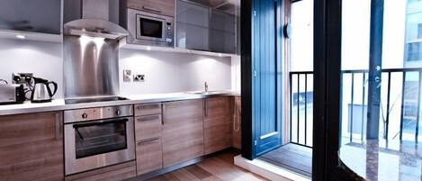 Microwave, coffee/tea maker, cookware/dishes/utensils