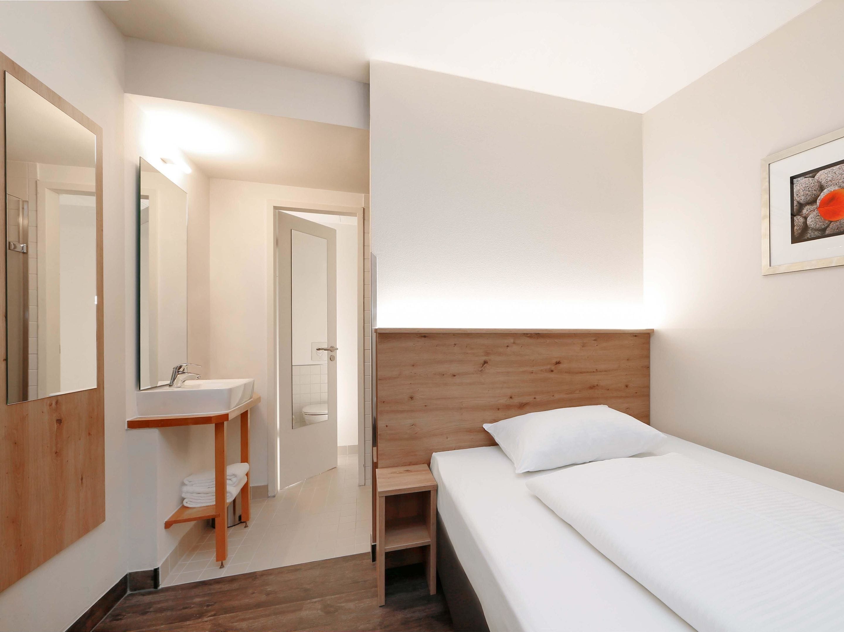 Enkeltrom | Lydisolert, wi-fi (inkludert) og sengetøy