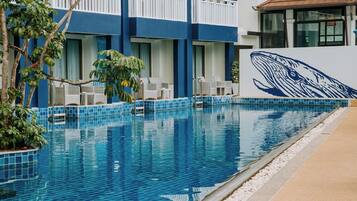 Outdoor pool, free pool cabanas, pool umbrellas