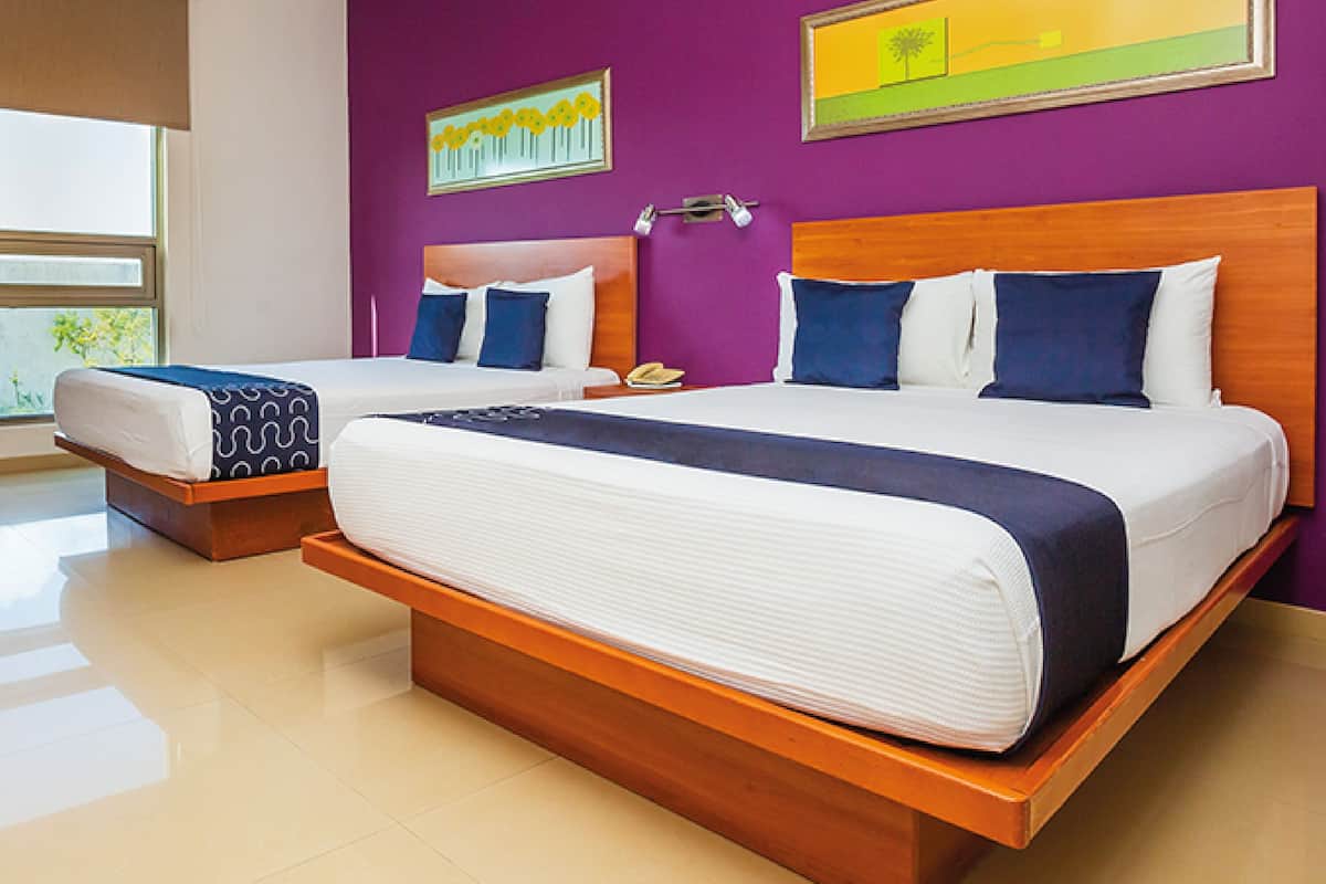 Standard Quadruple Room, 2 Double Beds | Premium bedding, desk, laptop workspace, blackout drapes