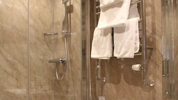 Eco-friendly toiletries, hair dryer, towels
