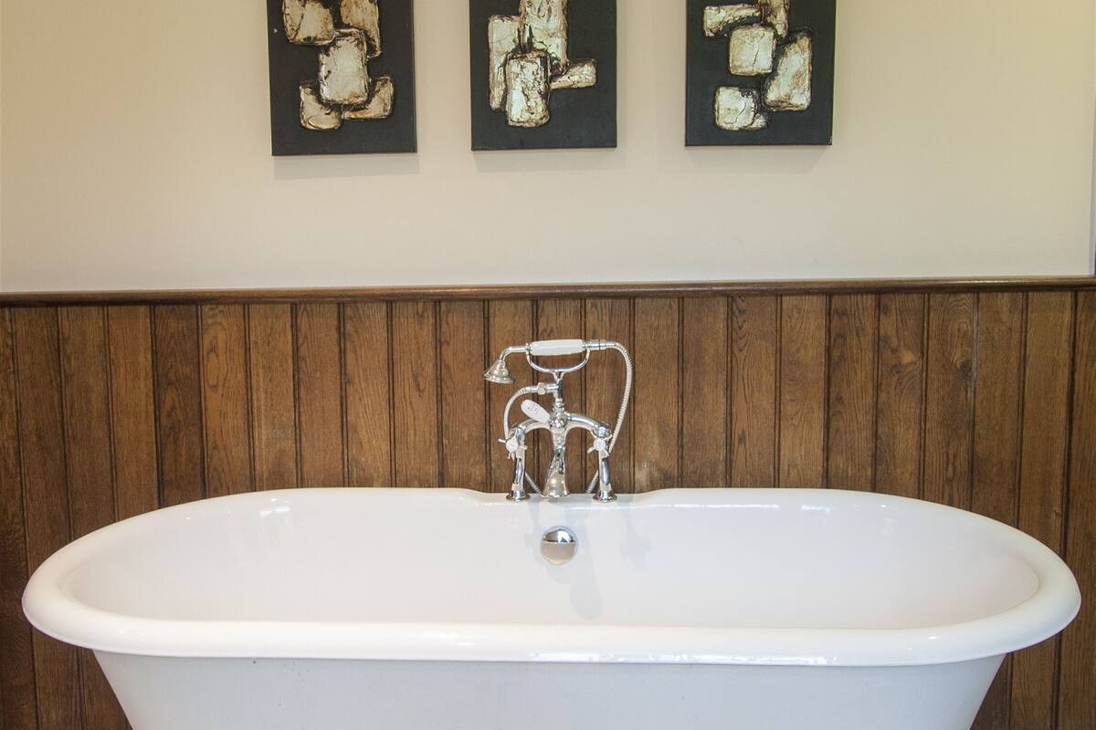 honeymoon suite, 1 king bed | bathroom | eco-friendly toiletries, hair dryer, towels