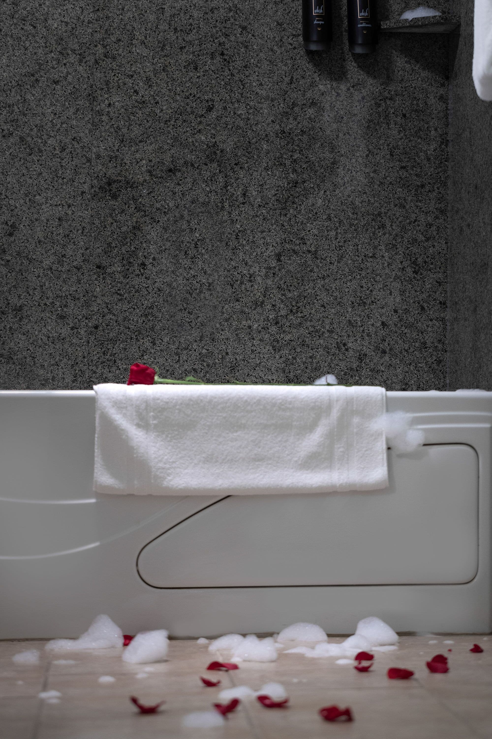 combined shower/bathtub, jetted bath, designer toiletries, hair dryer