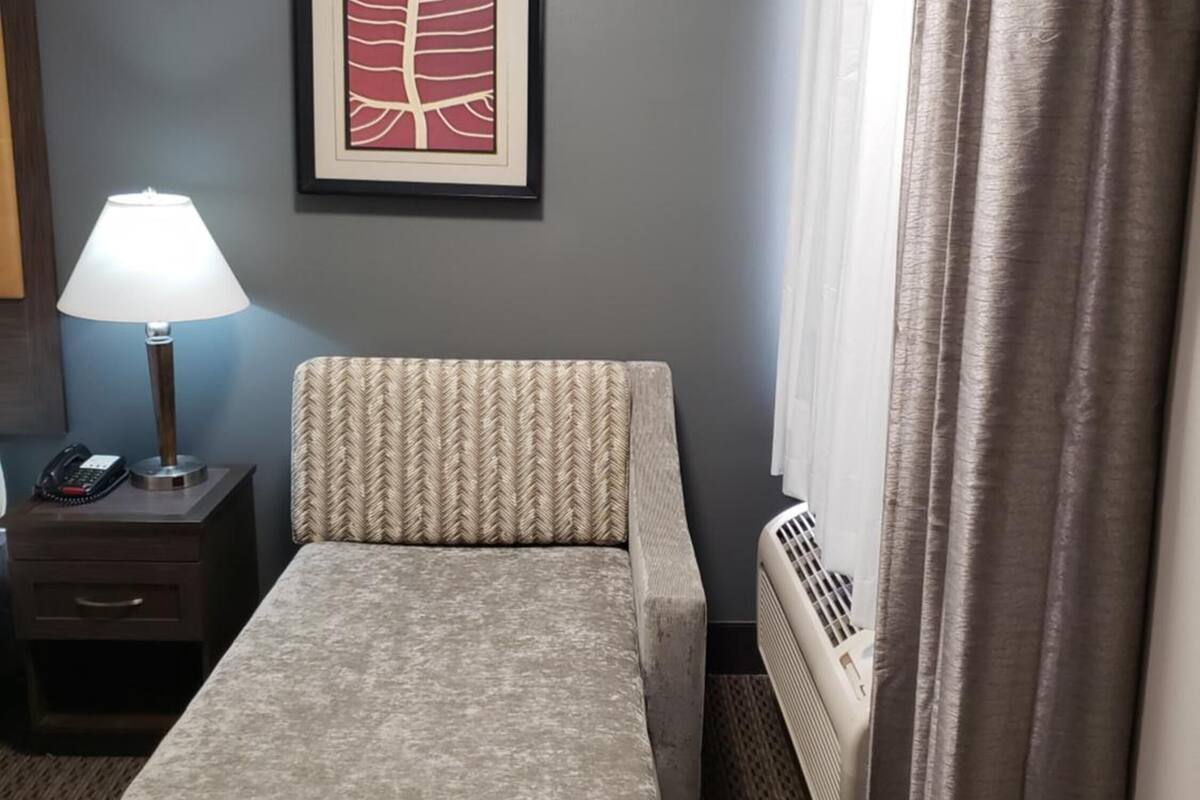 premium bedding, pillow-top beds, desk, blackout curtains