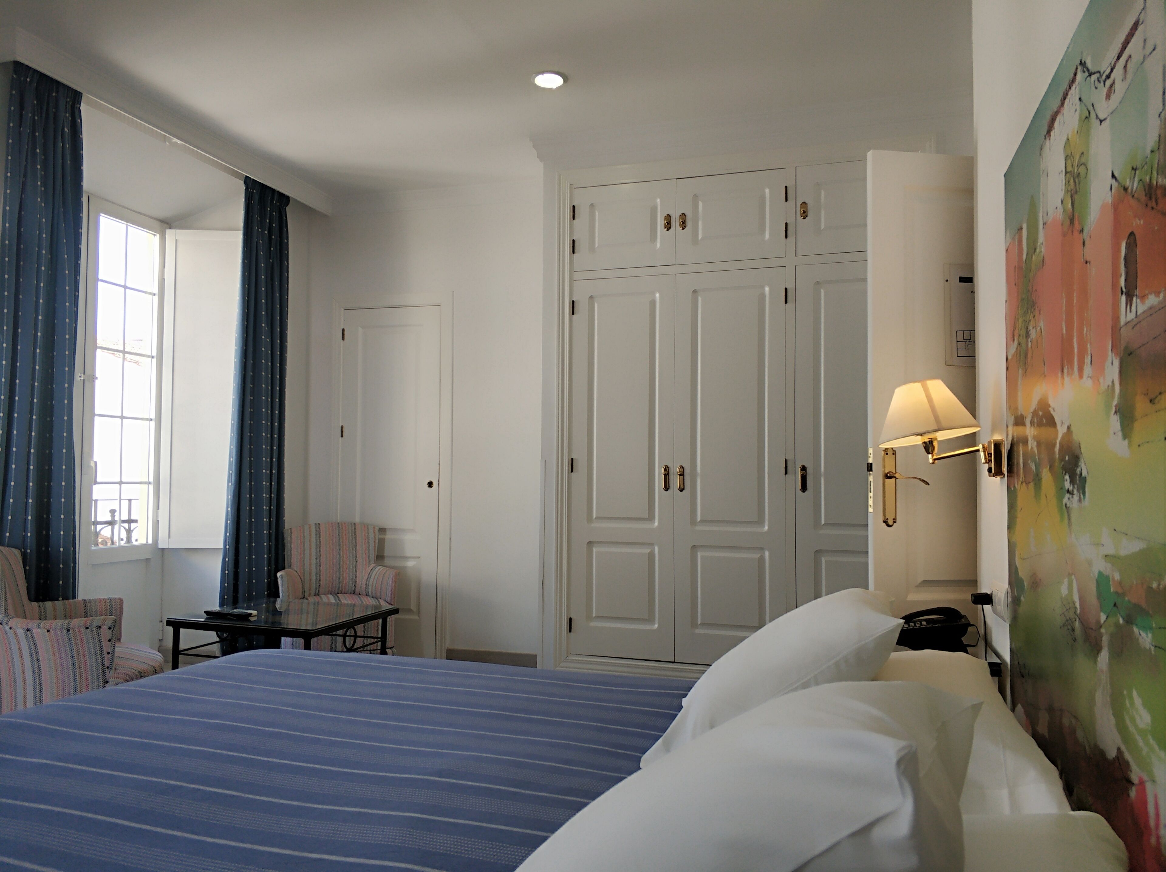 double room, 1 king bed, balcony, city view | in-room safe, desk, soundproofing, iron/ironing board