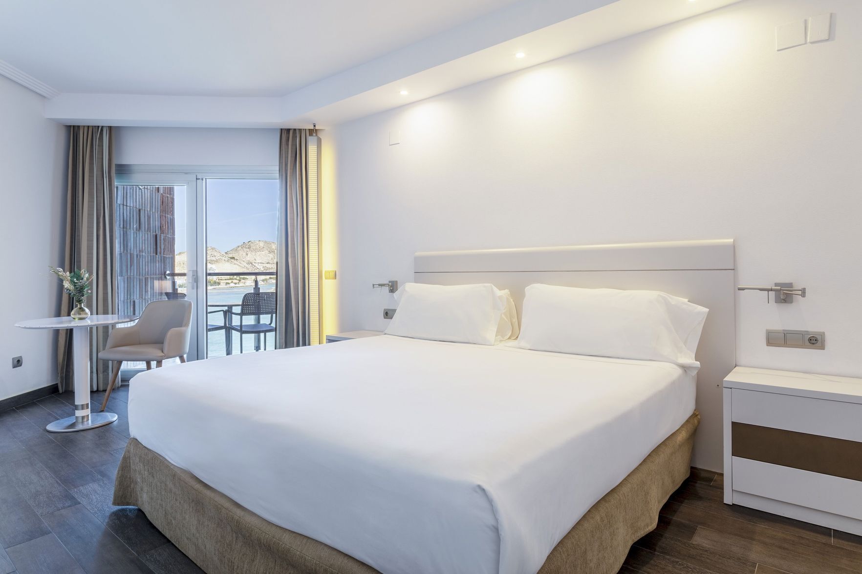 Premium bedding, down comforters, memory foam beds, minibar