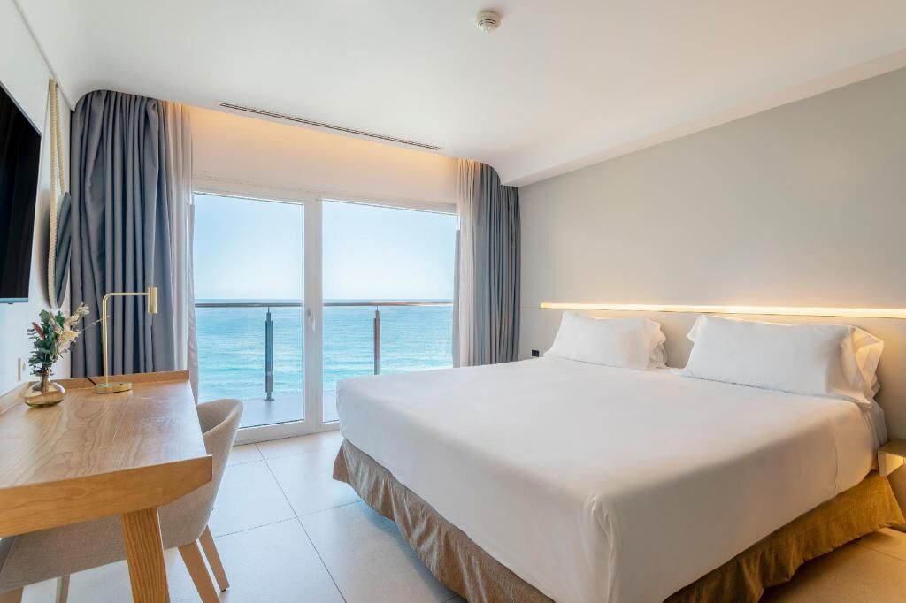 Premium bedding, down comforters, memory foam beds, minibar