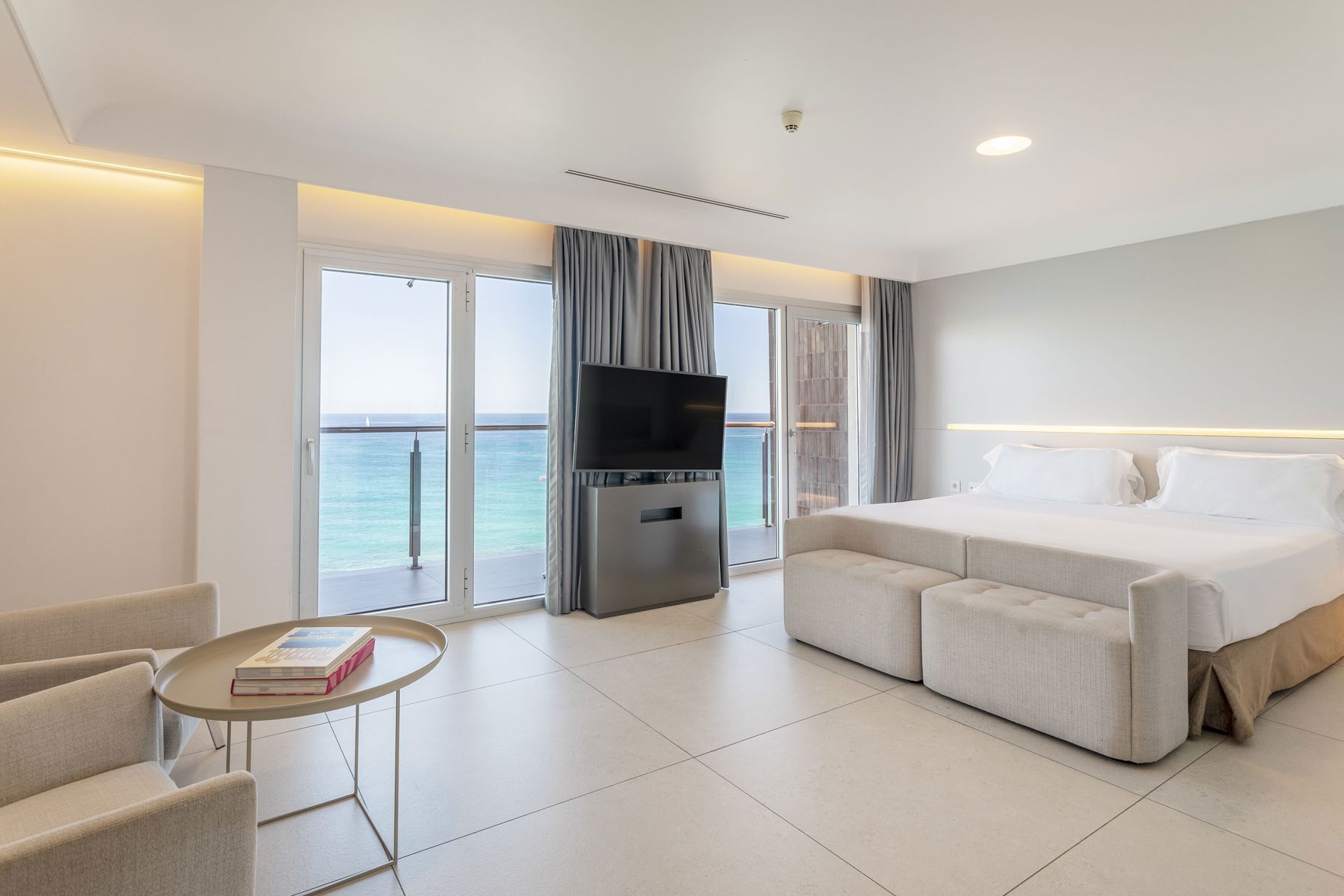 Premium bedding, down comforters, memory foam beds, minibar