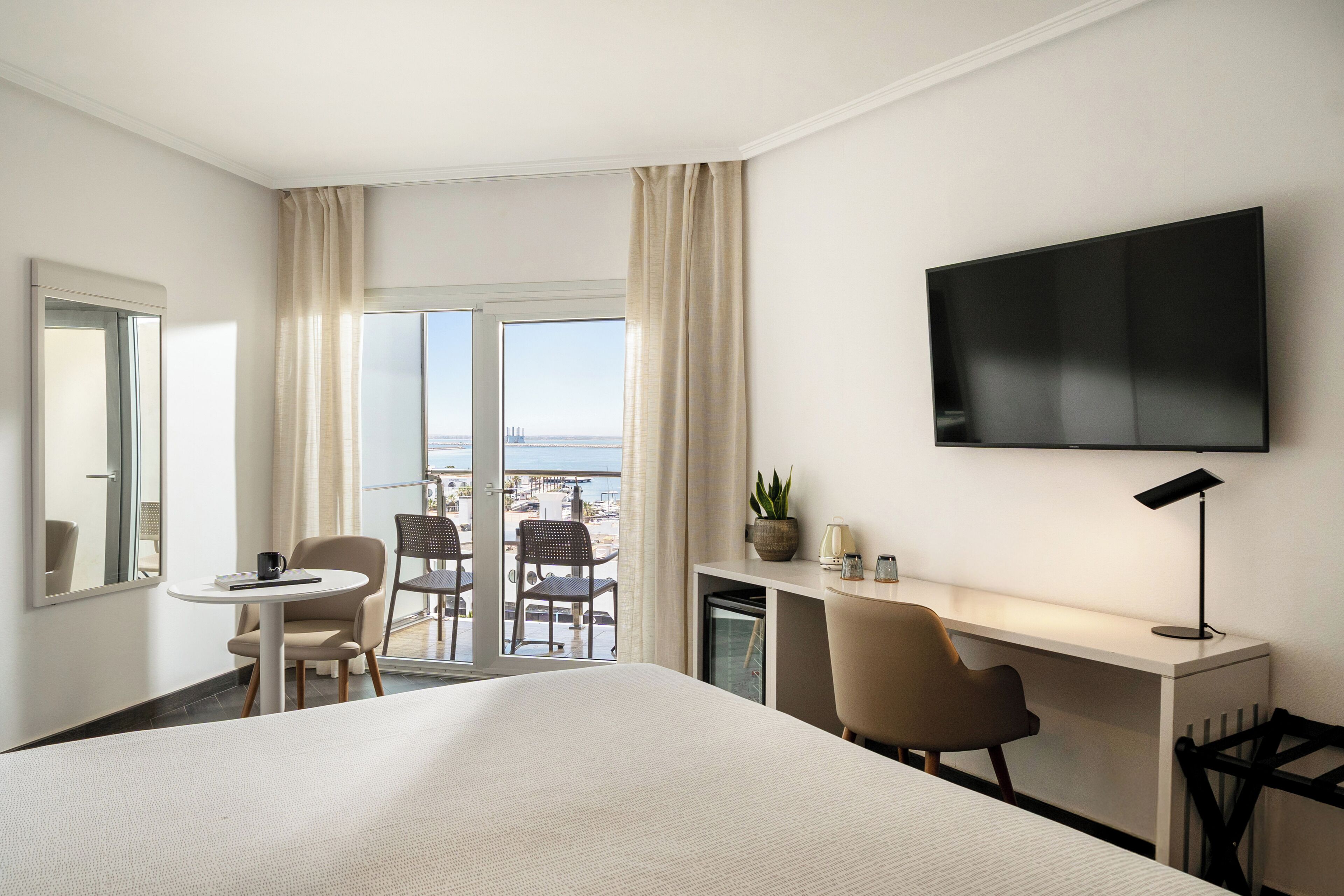 Premium bedding, down comforters, memory foam beds, minibar