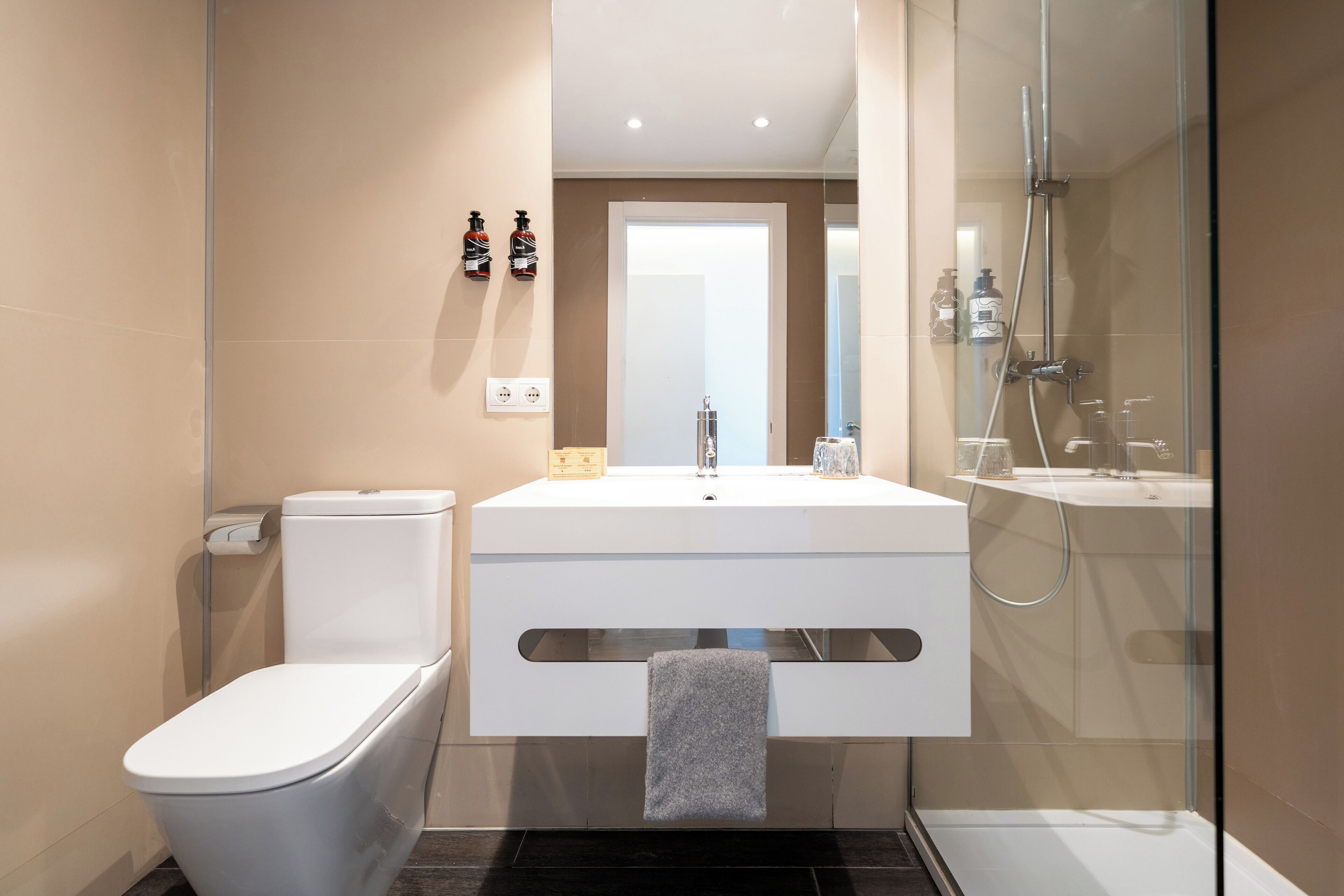 hair dryer, bidet, towels, soap