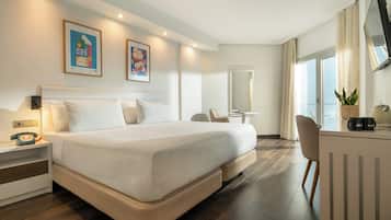 Premium bedding, down comforters, memory foam beds, minibar
