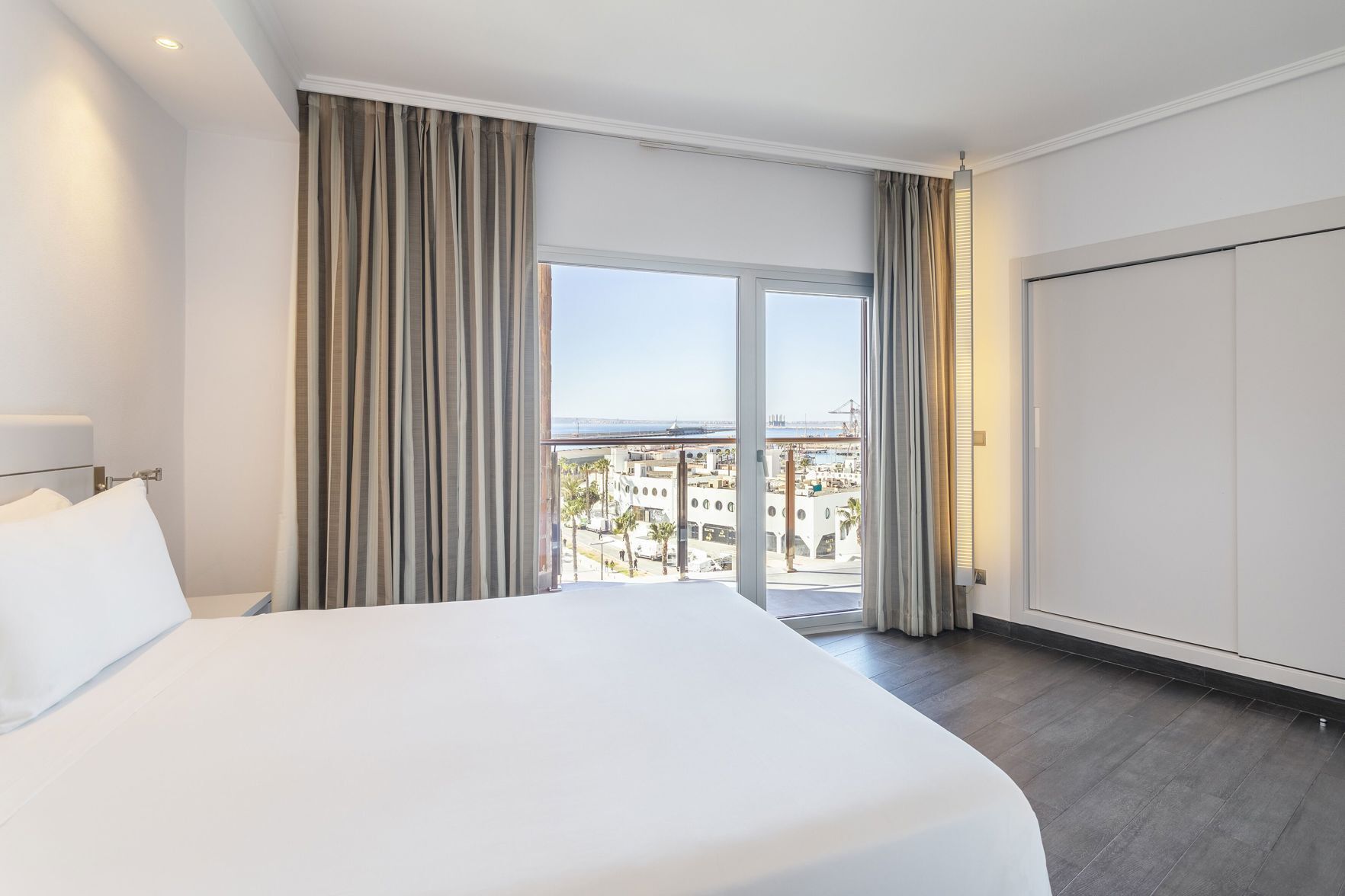 Premium bedding, down comforters, memory foam beds, minibar