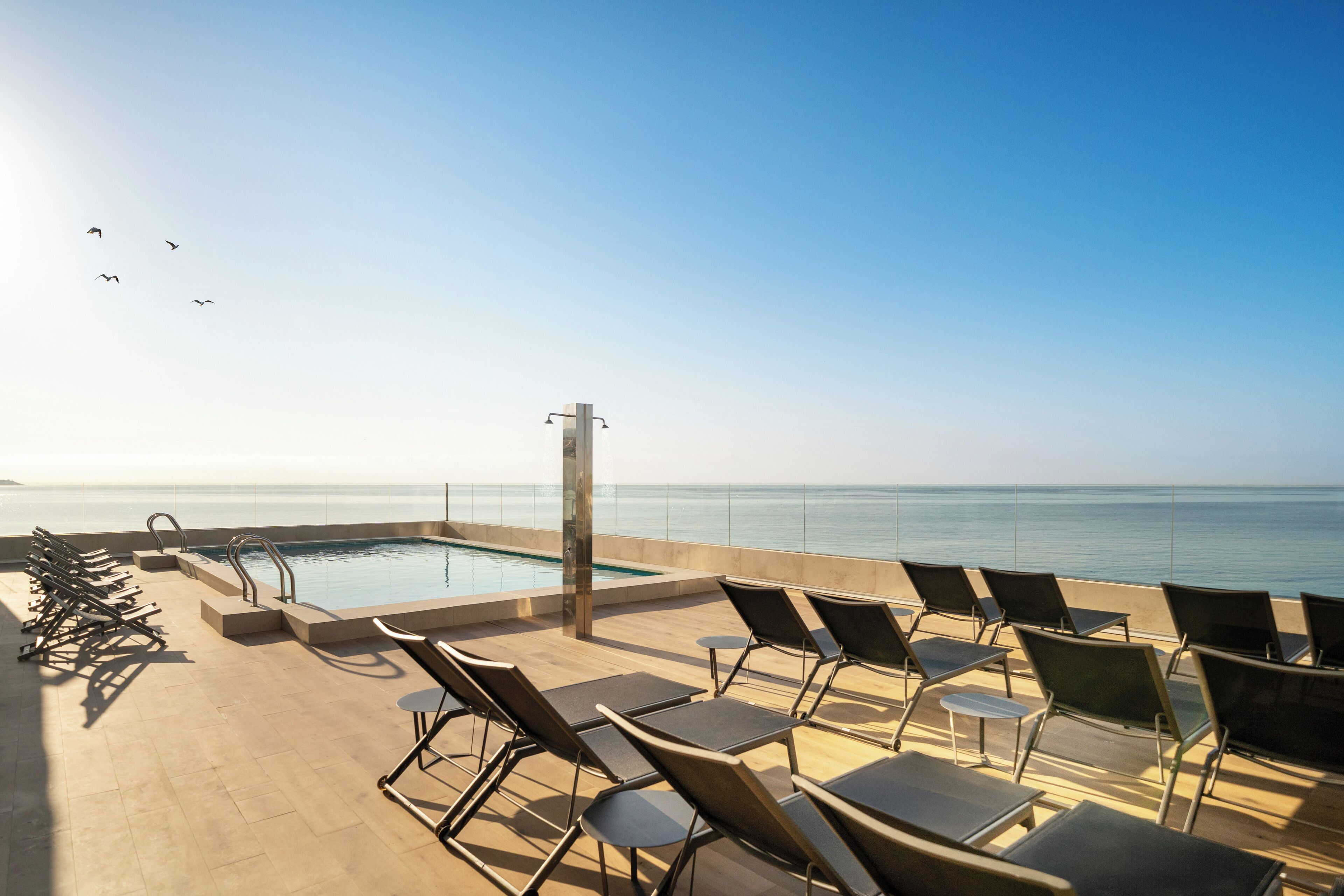 outdoor pool, pool loungers