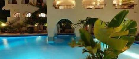 Seasonal outdoor pool, pool umbrellas, pool loungers