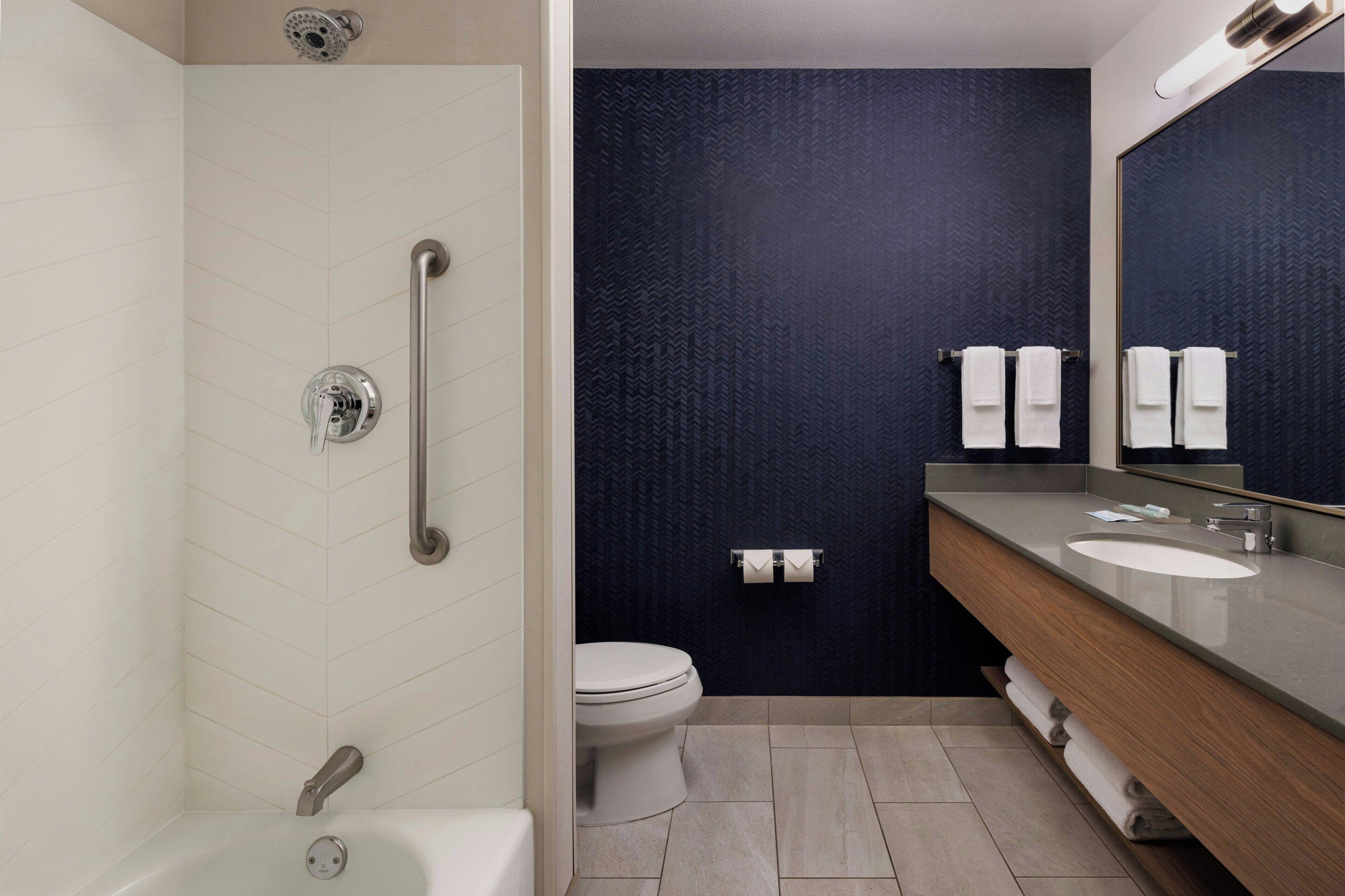 combined shower/bathtub, free toiletries, hair dryer, towels