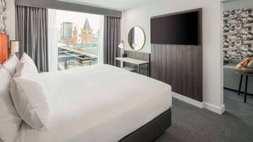 Suite, 1 King Bed, City View | Premium bedding, minibar, in-room safe, individually decorated