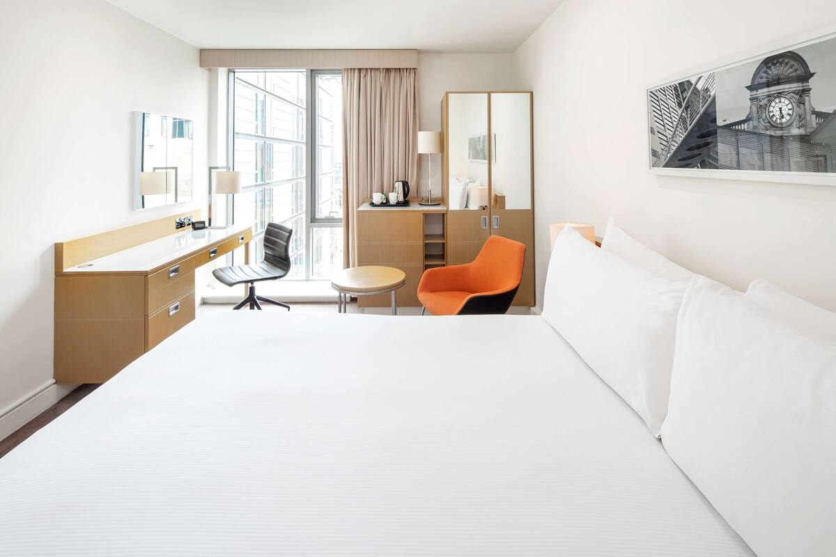 Ropa de cama de alta calidad y minibar