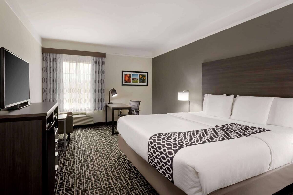 Premium bedding, desk, blackout drapes, iron/ironing board
