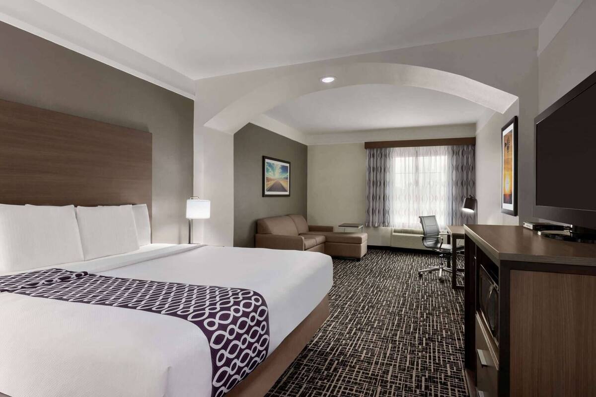 Premium bedding, desk, blackout drapes, iron/ironing board