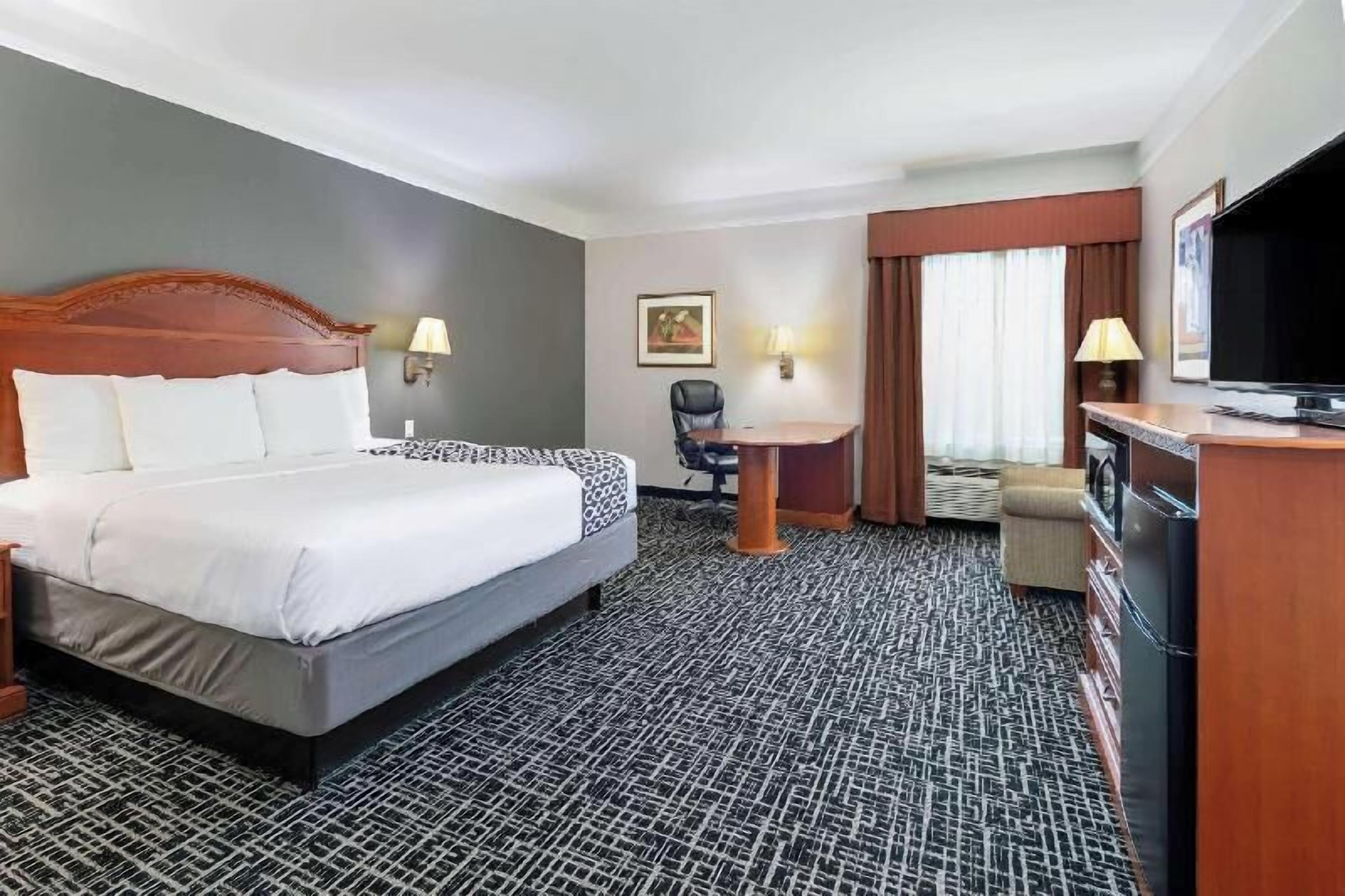 Premium bedding, desk, blackout drapes, iron/ironing board
