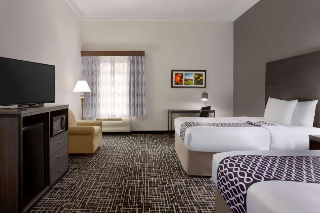 Premium bedding, desk, blackout drapes, iron/ironing board