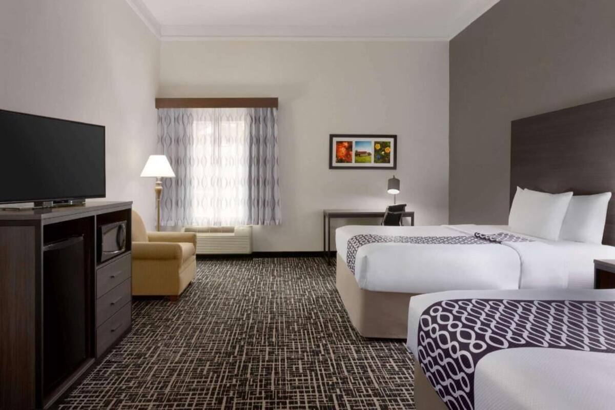 Premium bedding, desk, blackout drapes, iron/ironing board