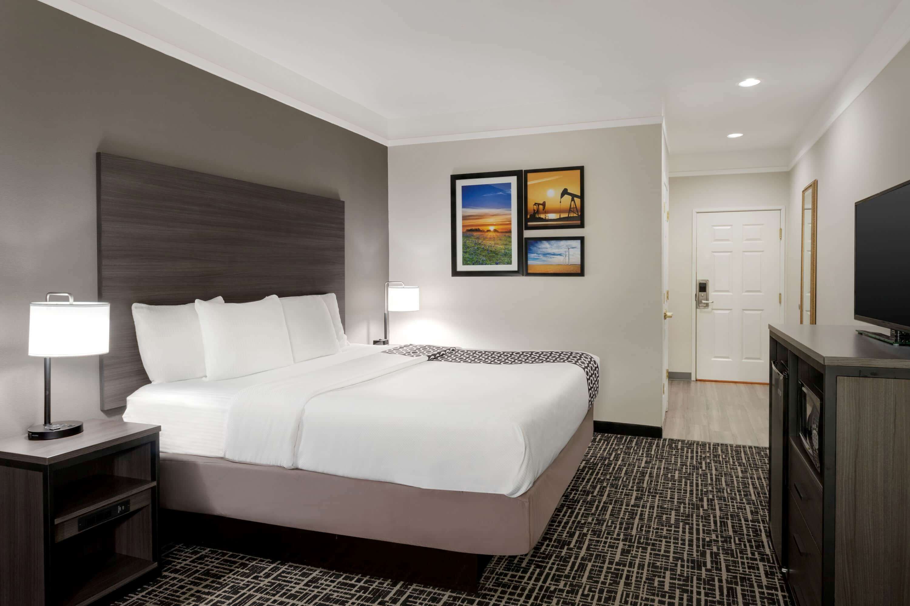 premium bedding, desk, blackout curtains, iron/ironing board