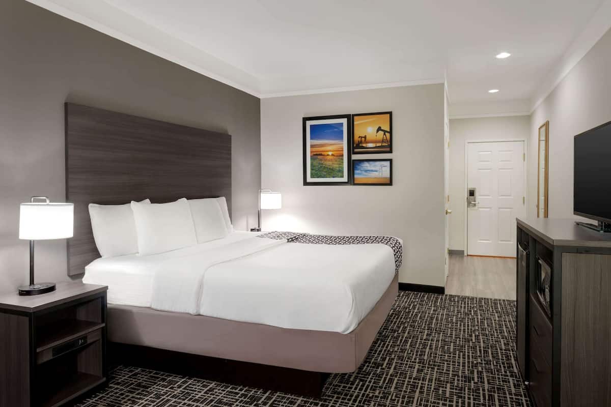 premium bedding, desk, blackout curtains, iron/ironing board