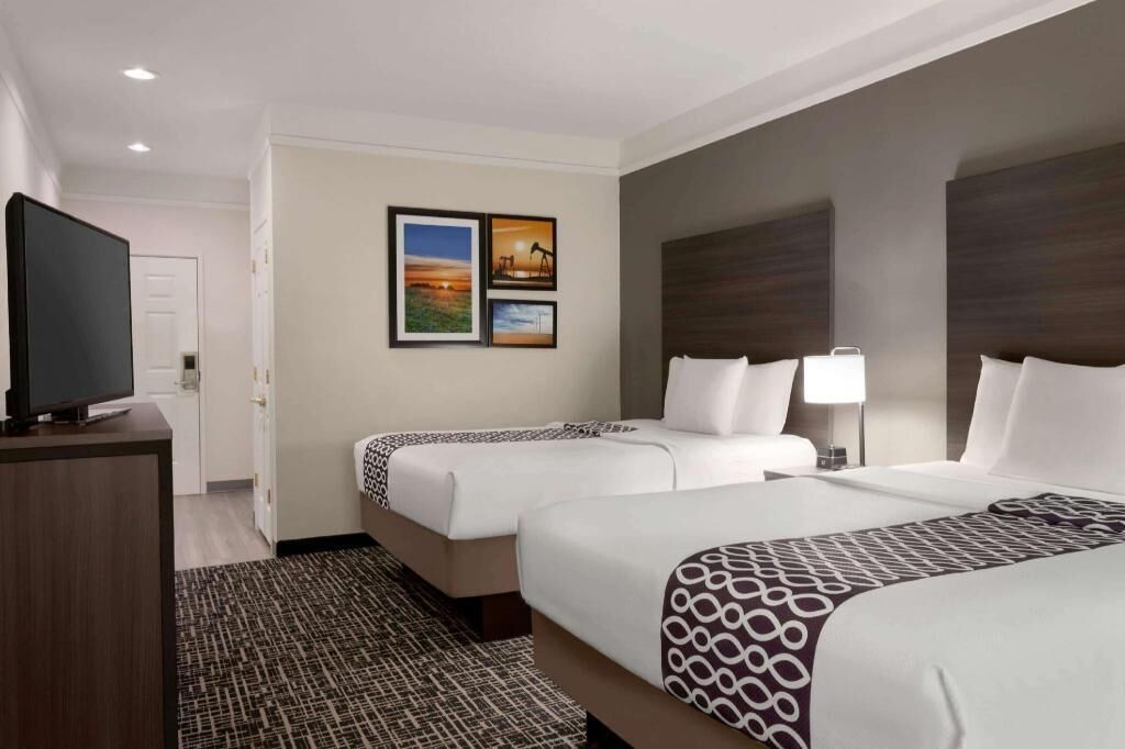 Premium bedding, desk, blackout drapes, iron/ironing board