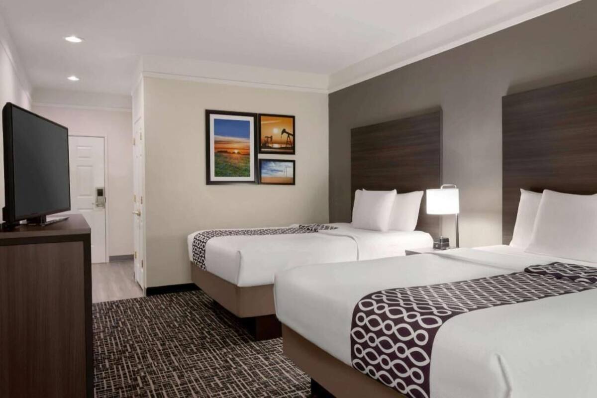 Premium bedding, desk, blackout drapes, iron/ironing board