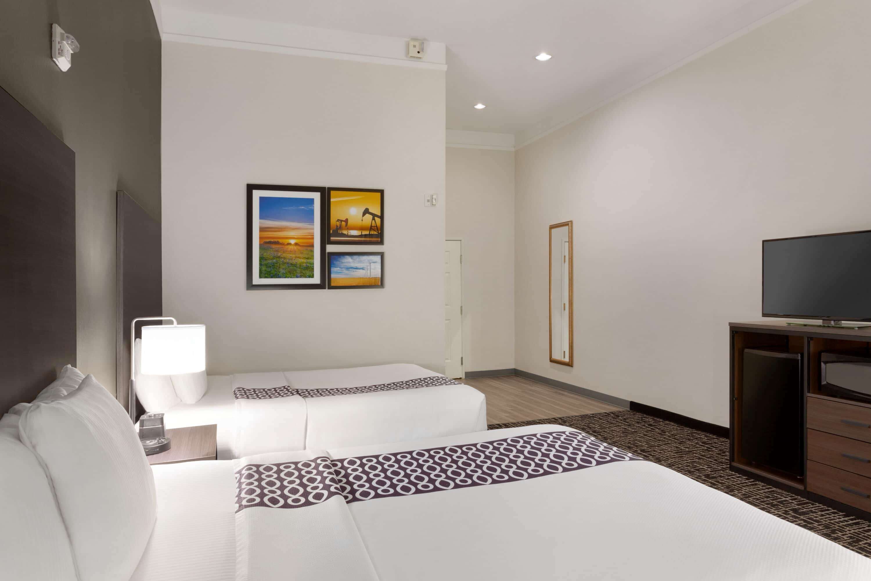 premium bedding, desk, blackout curtains, iron/ironing board