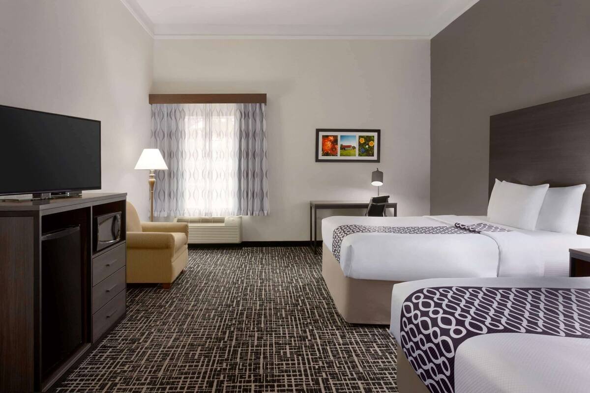 Premium bedding, desk, blackout drapes, iron/ironing board