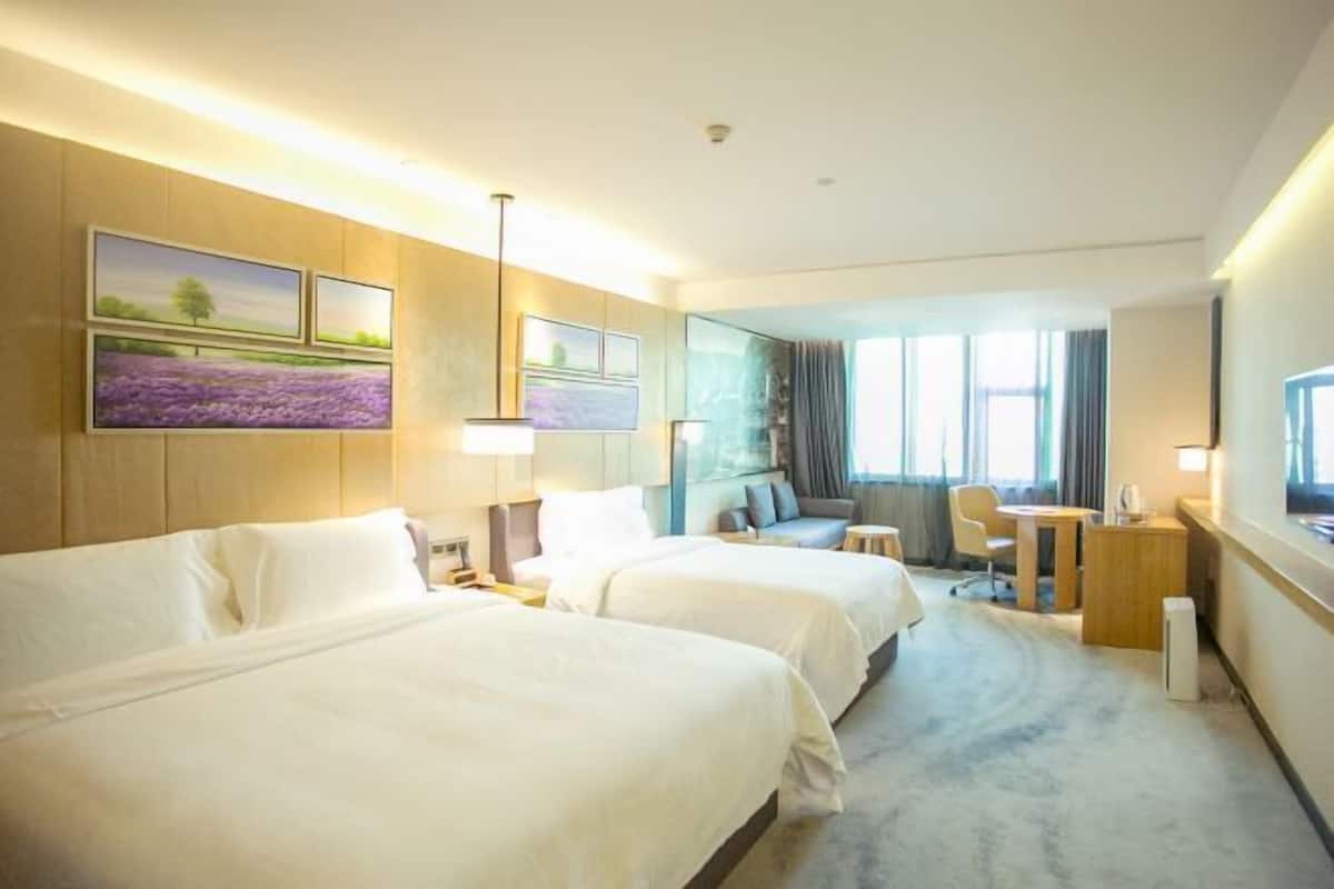 Premium bedding, down comforters, pillowtop beds, minibar