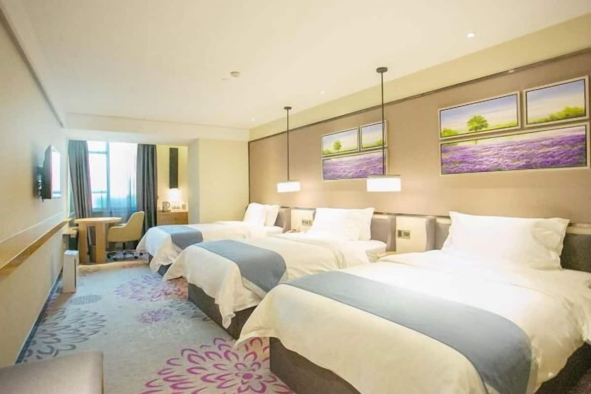 Premium bedding, down comforters, pillowtop beds, minibar