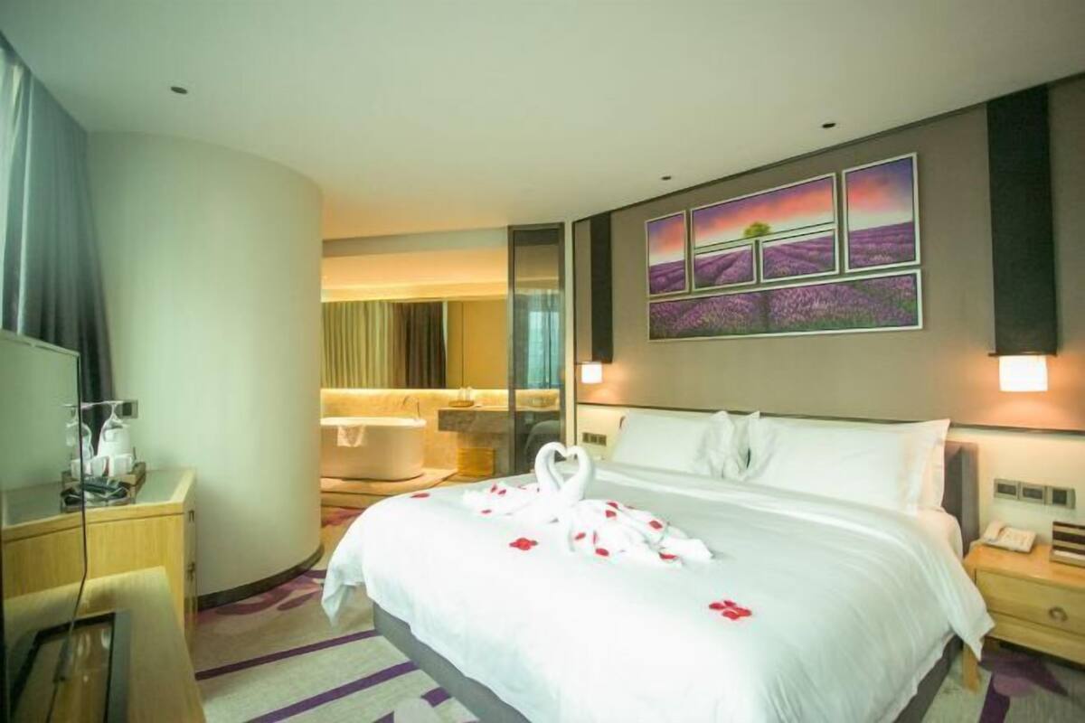 Premium bedding, down comforters, pillowtop beds, minibar