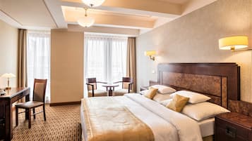 Deluxe Double Room, City View | Minibar, in-room safe, individually decorated, desk