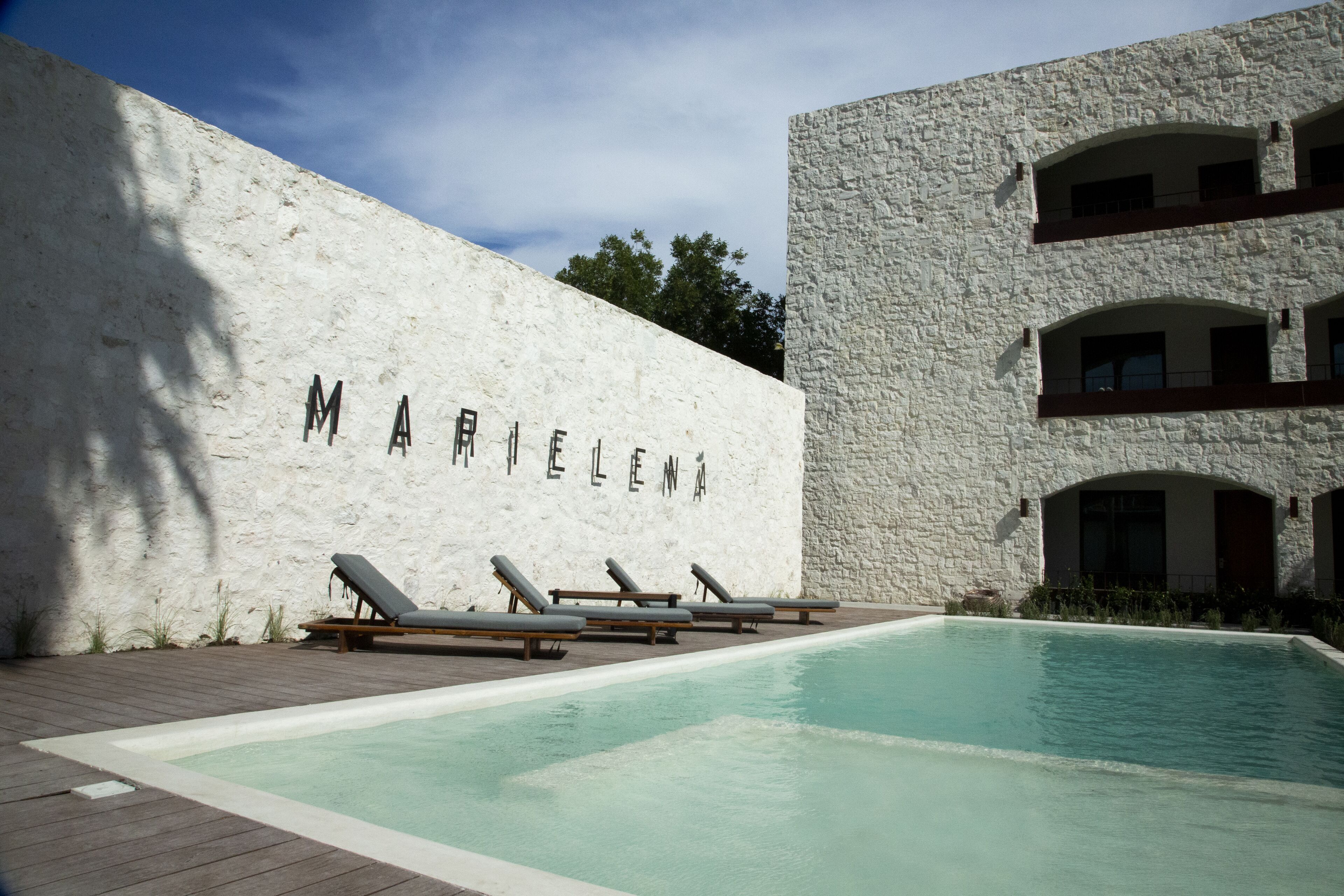 outdoor pool, pool umbrellas, pool loungers