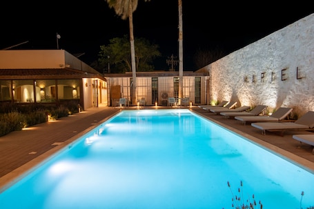 Outdoor pool, pool umbrellas, sun loungers