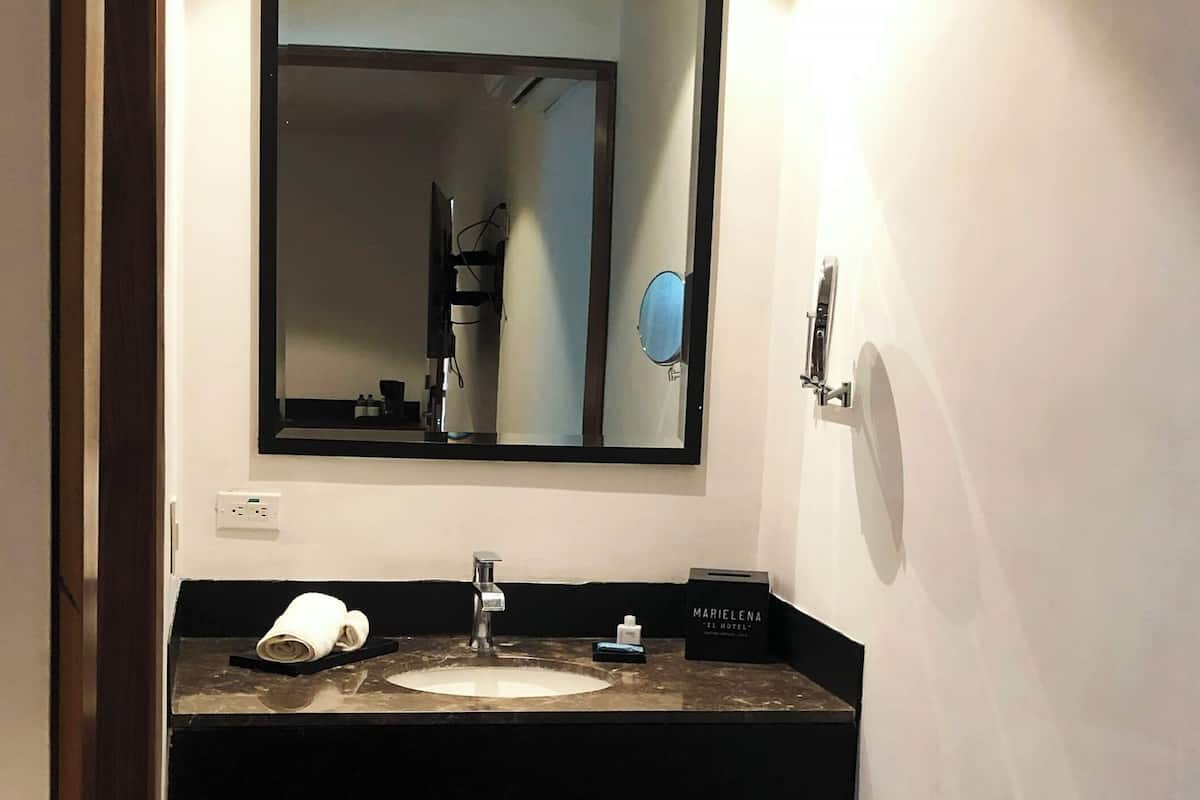 superior room | bathroom | shower, rainfall showerhead, free toiletries, hair dryer