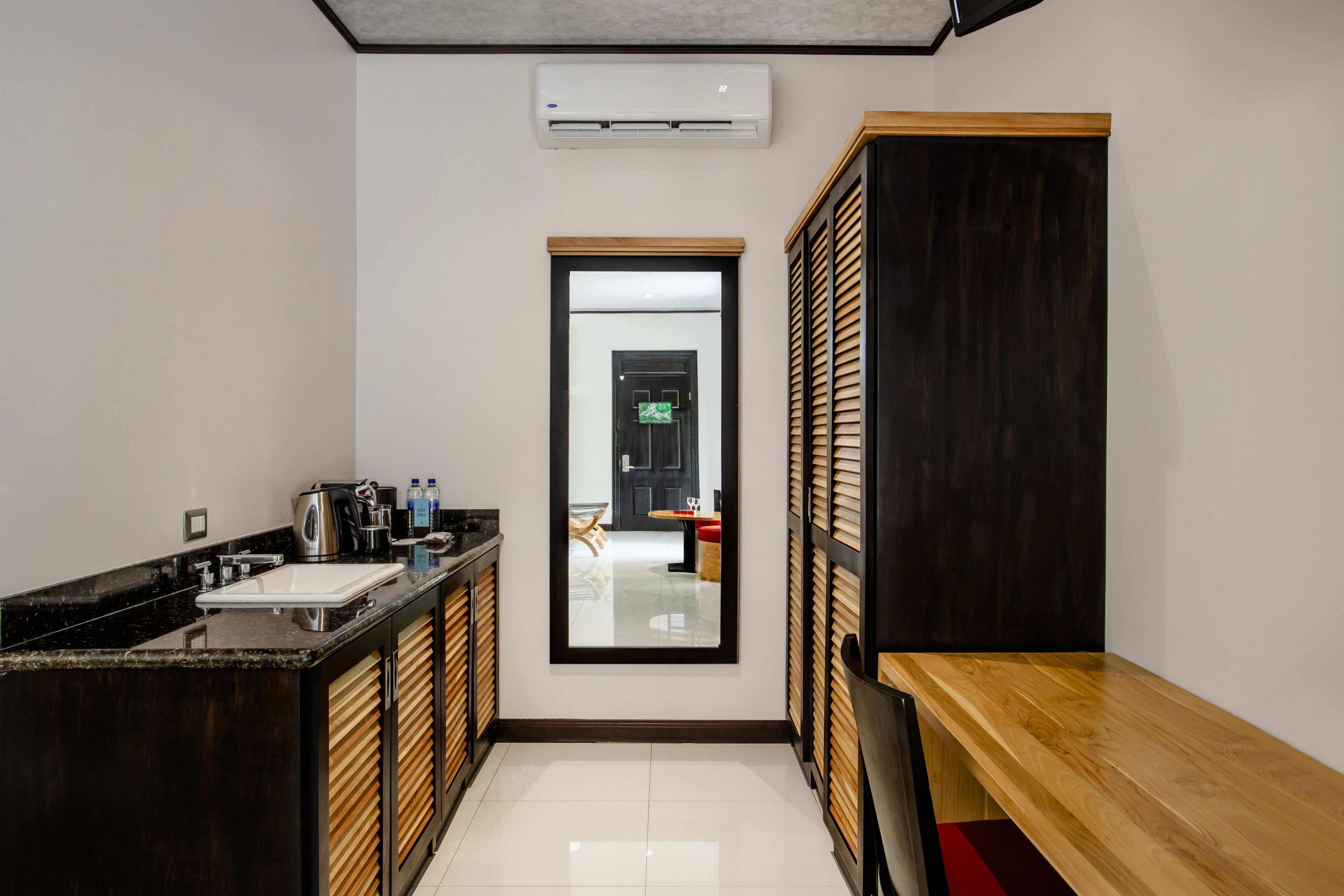 premium suite | private kitchenette | fridge, coffee/tea maker, cookware/dishes/utensils