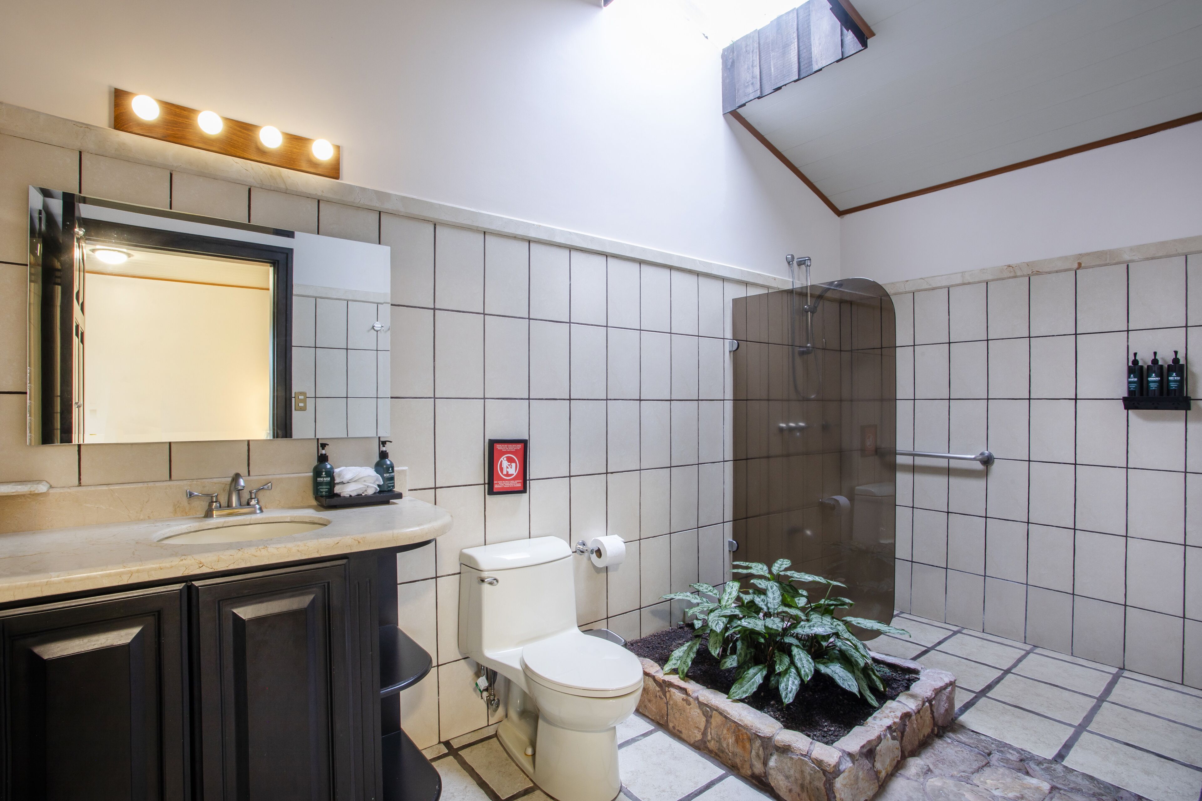 junior suite | bathroom | shower, rainfall showerhead, free toiletries, hair dryer