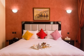 Ropa de cama de alta calidad y minibar 